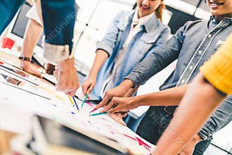 Multi-ethnic diverse team, business partner, or college students in project meeting at modern office or university