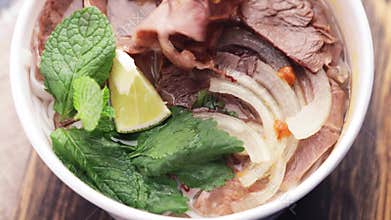 Box with Asian food and meat