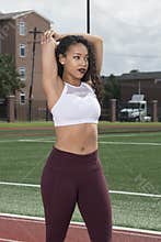 Stunning African-American fitness model on outdoor track