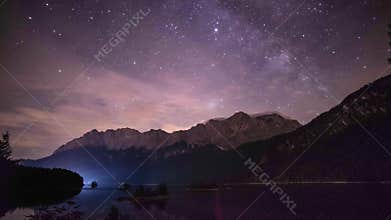 4K night time lapse of lake Eibsee and mountain Zugspitze in the German alps Bavaria