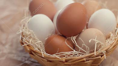 Pan movement showing a basket with a n ecological eggs