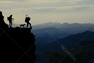 Mountain hikers silhouette