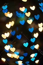 Bokeh background with unique heart shaped lights or blurred lights background
