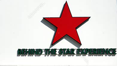 Heineken five-pointed red star and tag line