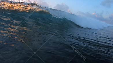 Ocean wave breaking on camera