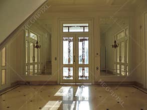 Interior view of the foyer in a cozy house.