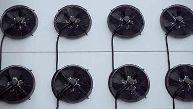 Air conditioner unit fan rotating.