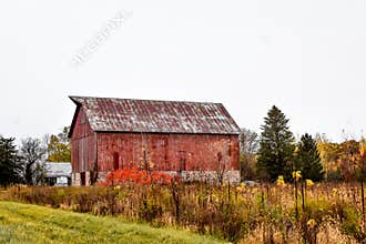 Rustic Old Barn with Field of fall Colors