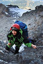 Mountaineer woman climbing