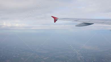 Air plane flying over cloud scape