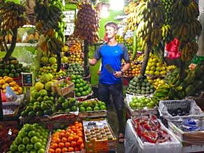 Man and fruits of Sri Lanka