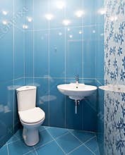 Toilet room in blue colors