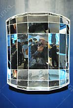 Photographer`s geometrical selfportrait in a diamant