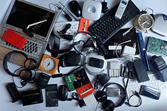 Pile of used Electronic Waste on white background