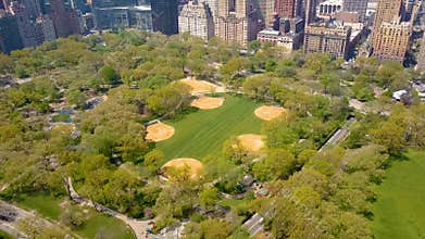 Aerial view of Central Park, New York, USA, Skyscrapers on background. Luxury residential buildings.