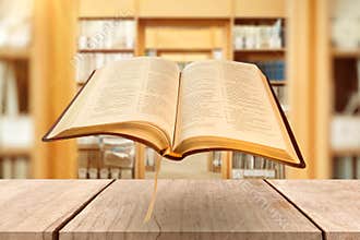 Composite image of close up of open book