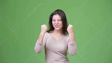 Young happy beautiful woman looking excited