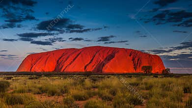 Majestic Uluru at sunset on a clear winter`s evening in the Northern Territory, Australia