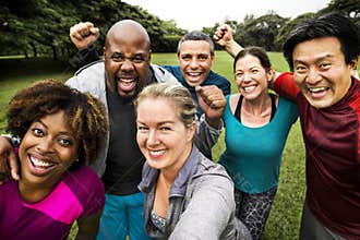Group of cheerful diverse friends in the park