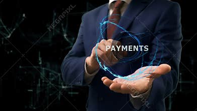 Businessman shows concept hologram Payments on his hand