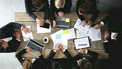 Business people analyzing documents