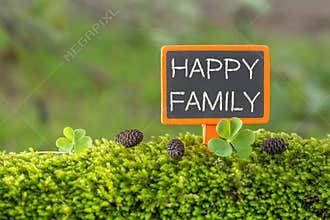 Happy family text on small blackboard