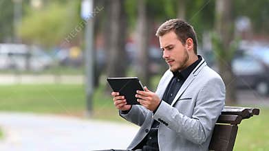 Businessman reads bad online news and complaints
