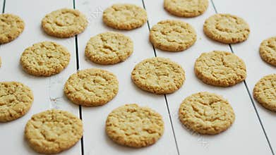 Healthy oatmeal cookies on white wood background, Side view.