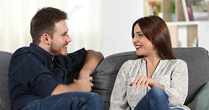 Couple dating and flirting talking at home