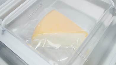 Cheese vacuum packaging at factory