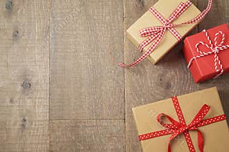 Christmas holiday background with gift boxs on wooden table