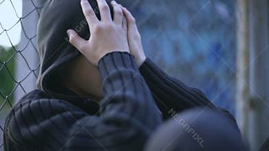 Teenage boy crying, school bullying, dysfunctional family, loneliness depression