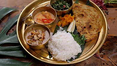 Assorted indian sri-lanka food set on wooden background. Dishes and appetisers of indeed cuisine, rice, lentils, paneer