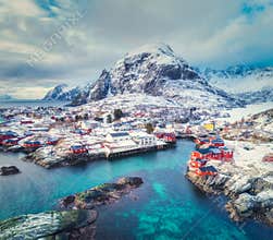 Aerial view of small village on the mountain in winter