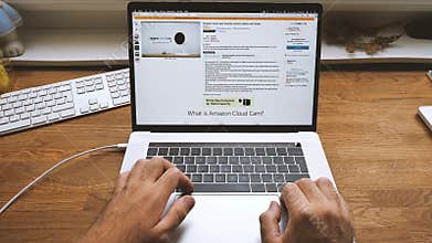 POV man shopping Amazon Prime Day on laptop Amazon Cloud Cam