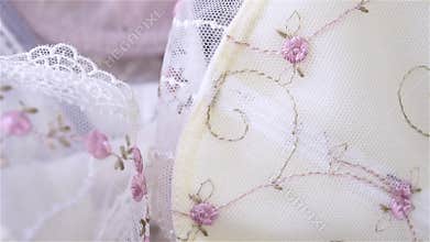 Beautiful beige and white silk and lace lingerie closeup