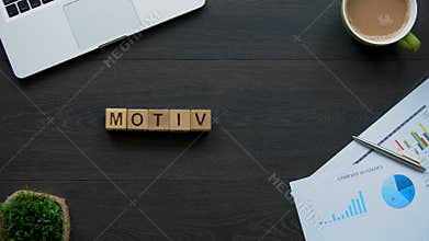 Motivation word made of cubes, reason for peoples actions, desires and needs