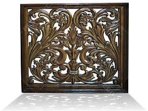 Floral vintage pattern carved in brown wood isolated over white