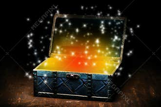 Blue coffer with orange gleam and sparkling lights