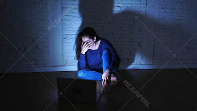 Woman suffering Internet cyber bullying