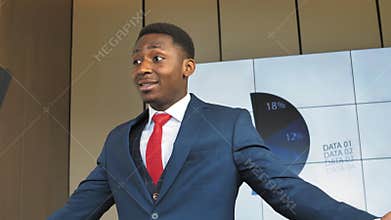 A successful African-American businessman shares his knowledge with the audience in slow motion