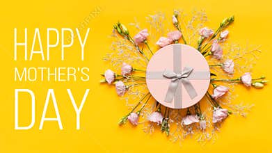 Happy Mother`s Day Background. Bright Yellow and Pastel Pink Colored Mother Day Background. Flat lay greeting card.
