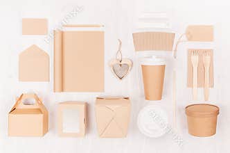 Mockup food takeaway packaging for cafe and restaurant - cardboard box for coffee, burger, noodles, sandwich, sushi on light wood.