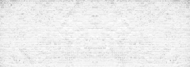 Simple grungy white brick wall with light gray shades pattern surface texture background in wide panorama banner format
