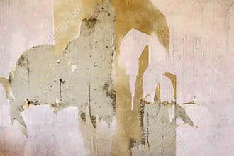 Aged room wall background with torn vintage wallpaper