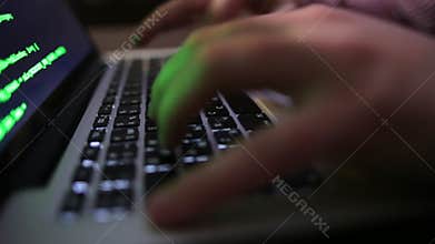 Close-Up of Hands Programmer Hacker is Coding and Developing Program with Laptop