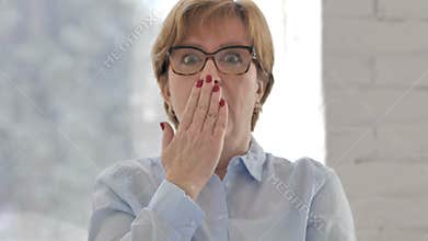 Portrait of Old Woman Gesturing Shock, Astonished