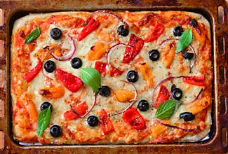 Freshly baked Vegetarian Pizza in baking tray