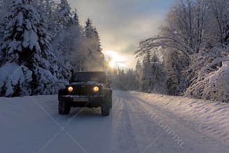 Jeep Wrangler Jk on winter road in Leningrad region