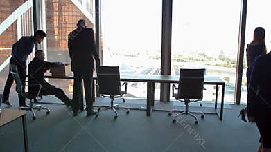 Multicultural Crowd Of Focused Businessmen and Businesswomen Coming To Work